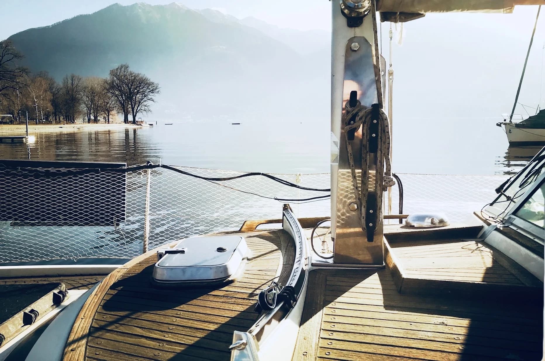 Sunny foredeck view across Lake Maggiore