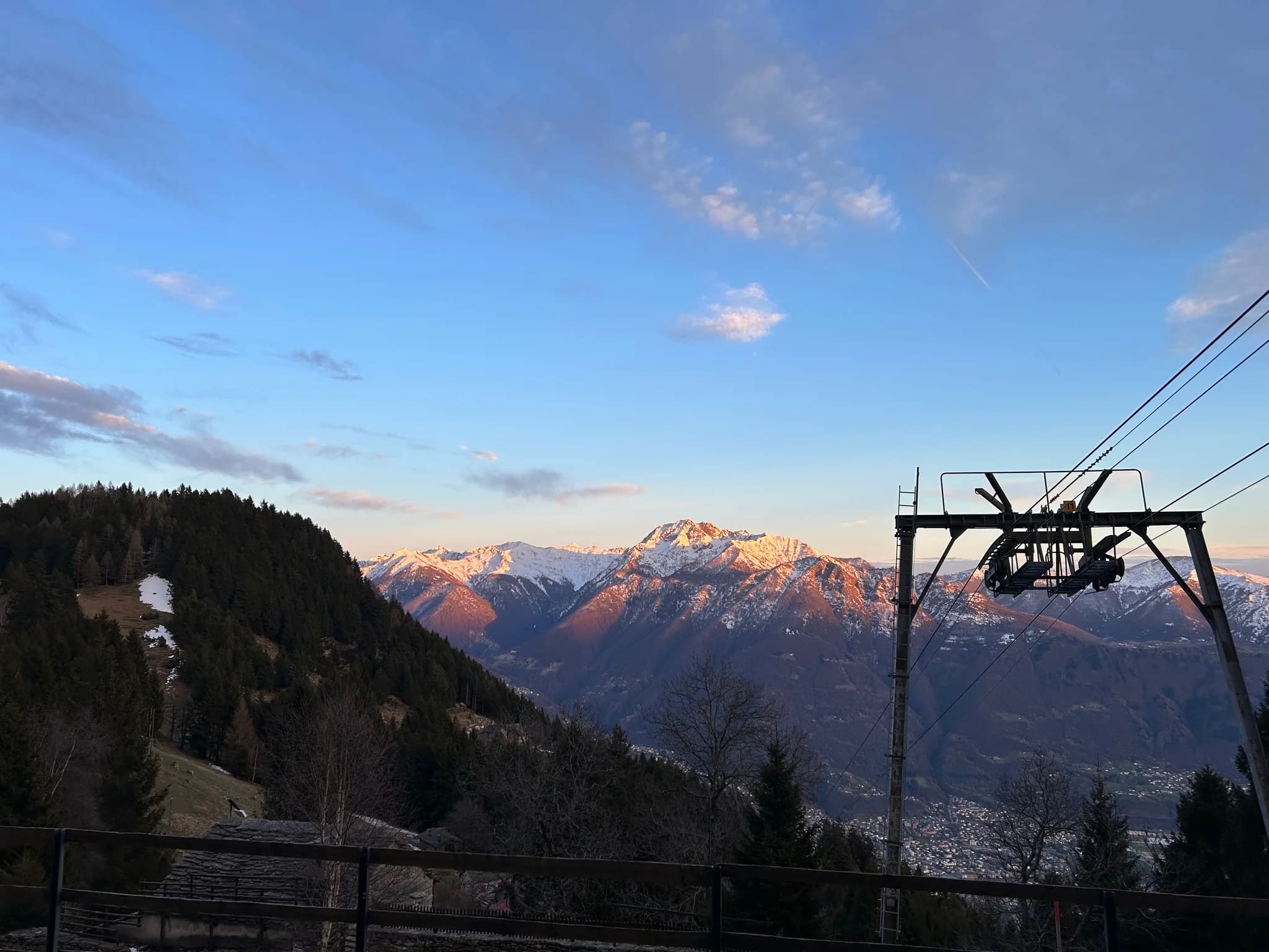 Mountain sunset view with cable lift