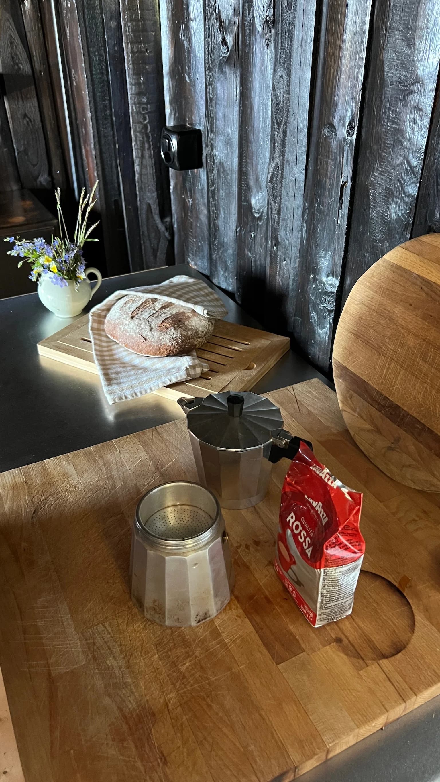 Coffee and fresh bread on the cabin counter