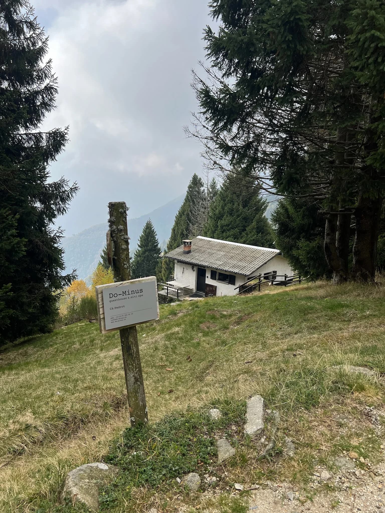 Ca' Pedrot cabin on the forested slope