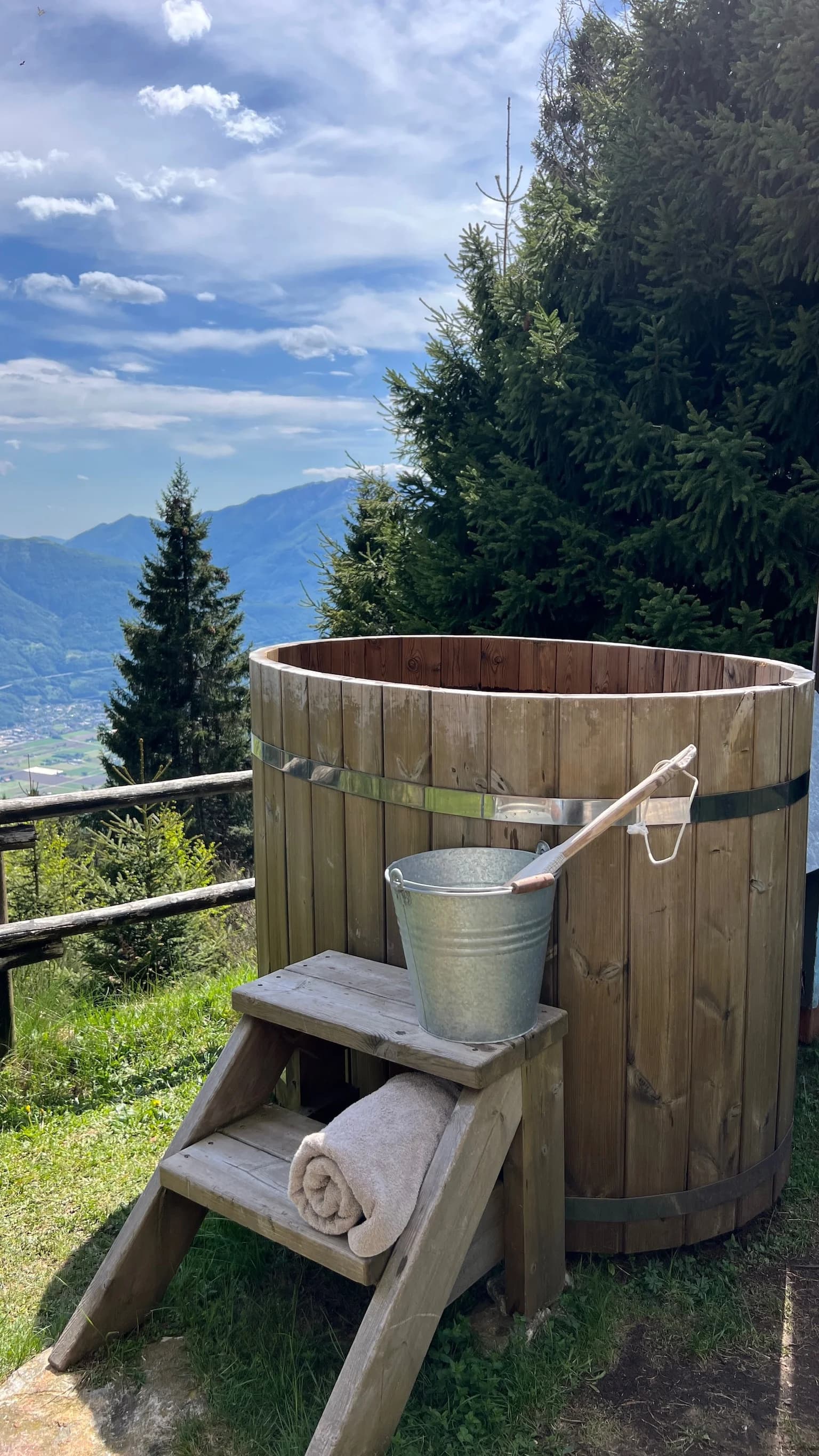 Wood-fired hot tub with open mountain view