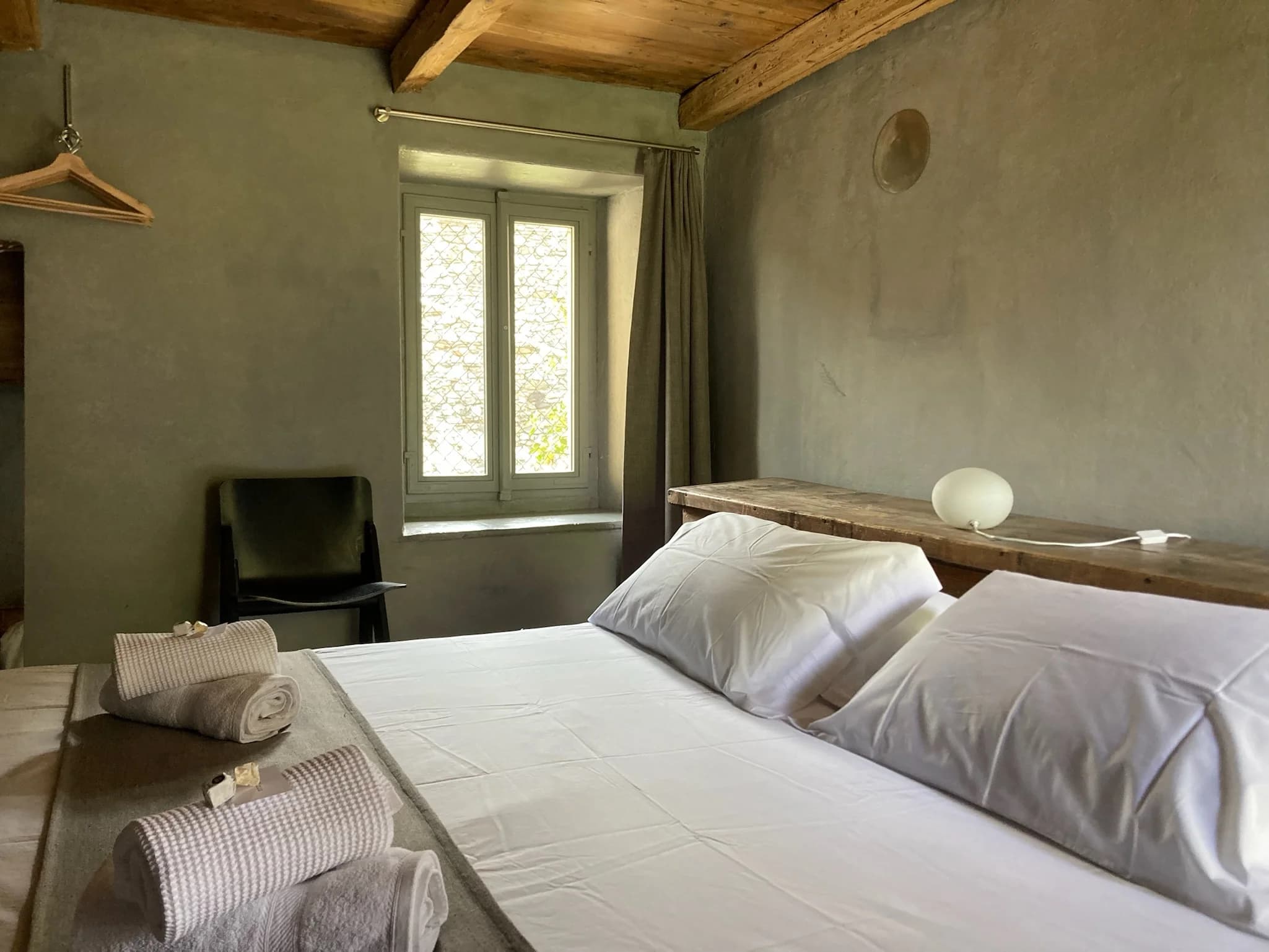 Double bedroom with exposed timber ceiling
